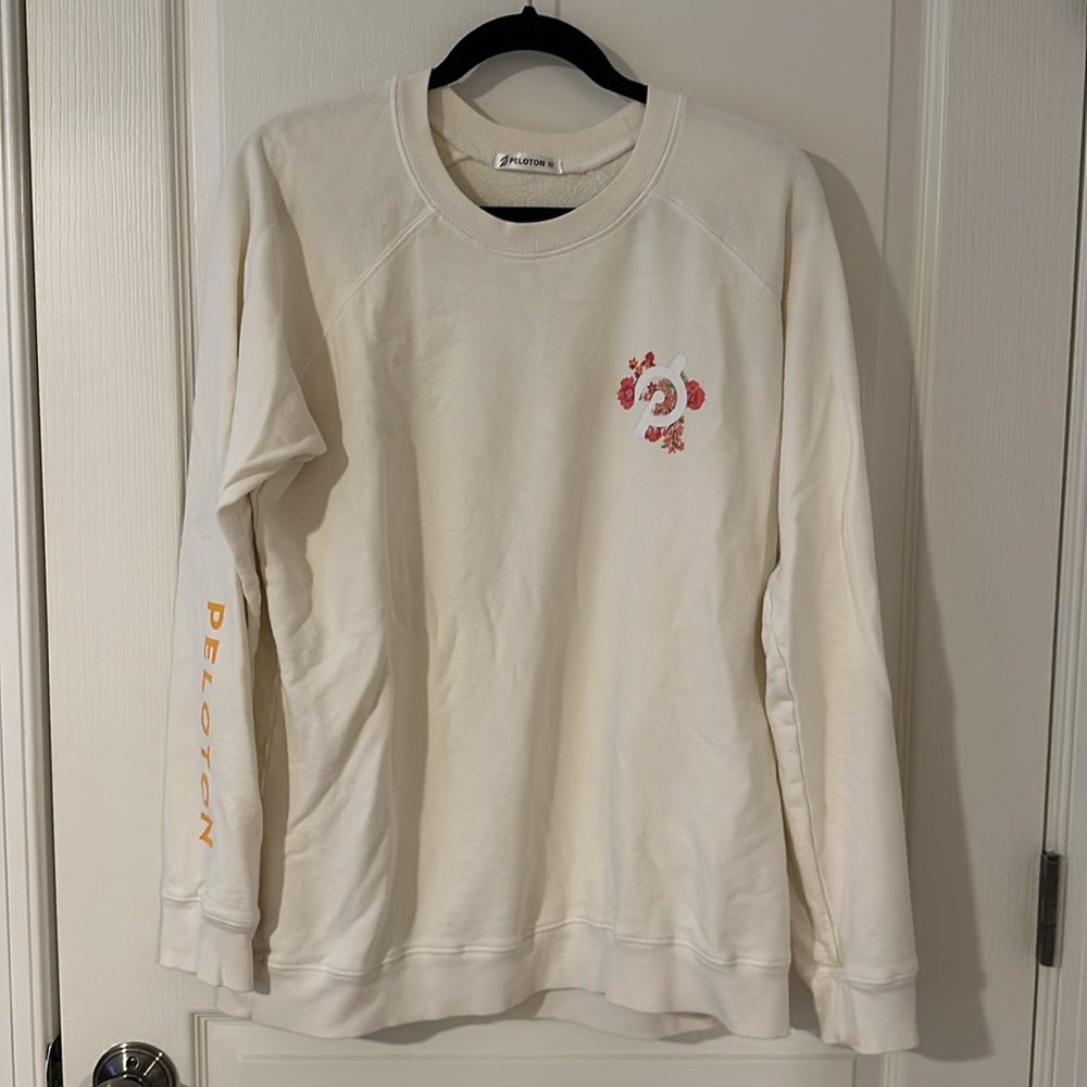 Peloton Cream Sweatshirt with Pink & Red Floral Logo - Picture 2 of 5